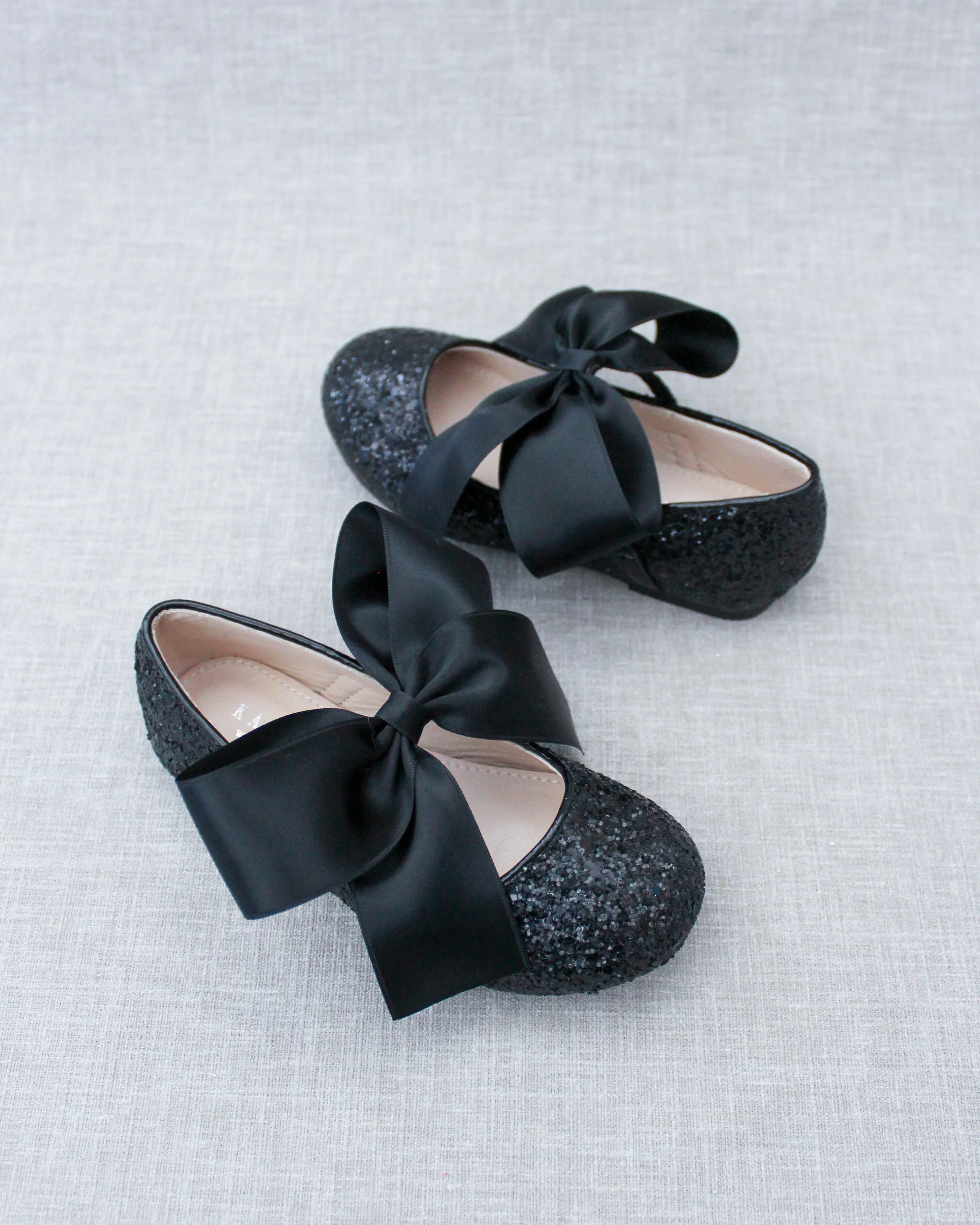 Black Satin Bow Ballet Flats with Sparkly Black Rock Design