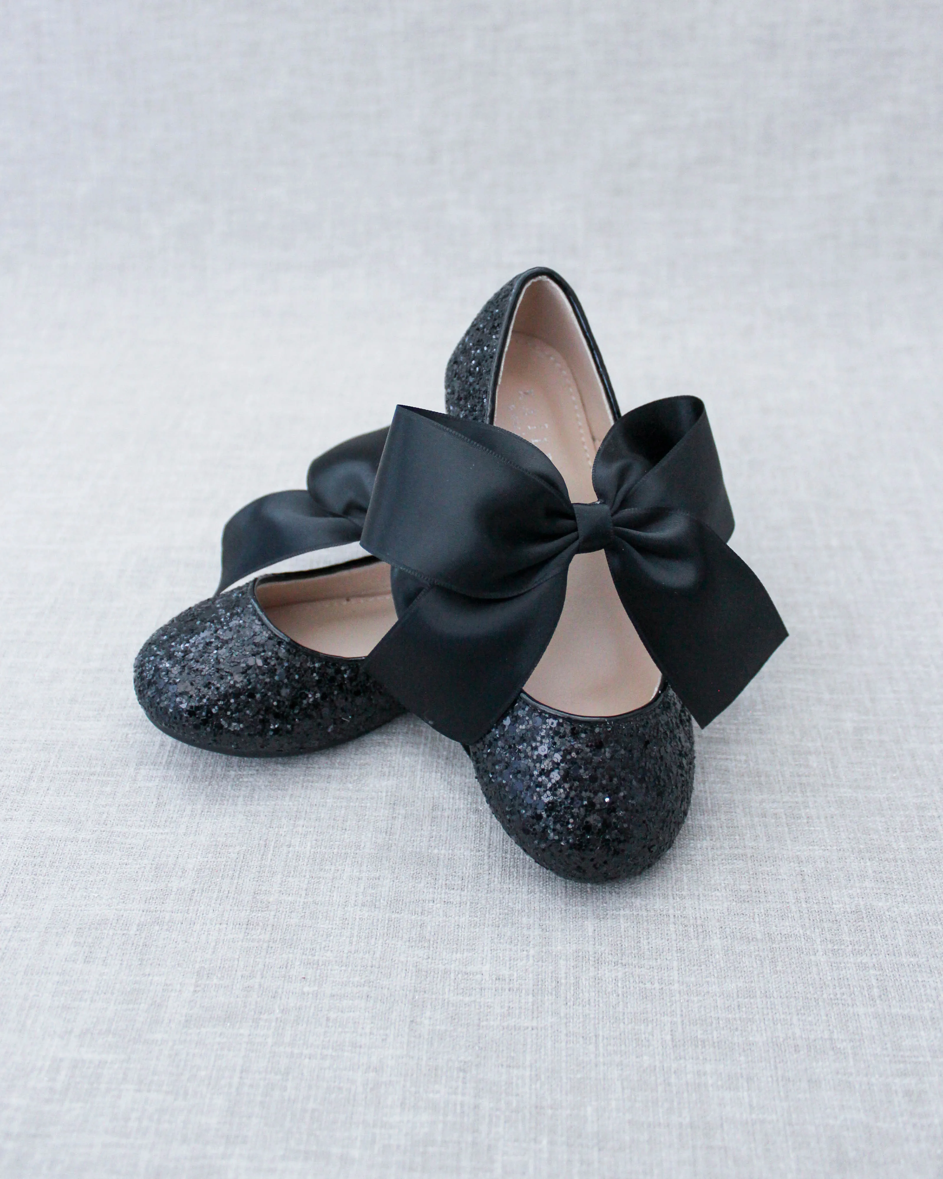 Black Satin Bow Ballet Flats with Sparkly Black Rock Design