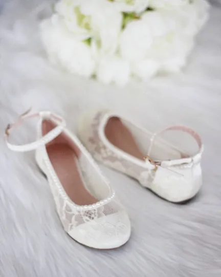 Ivory lace ballet flats with pearls ankle strap.