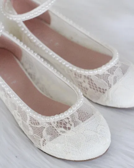 Ivory lace ballet flats with pearls ankle strap.