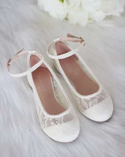 Ivory lace ballet flats with pearls ankle strap.