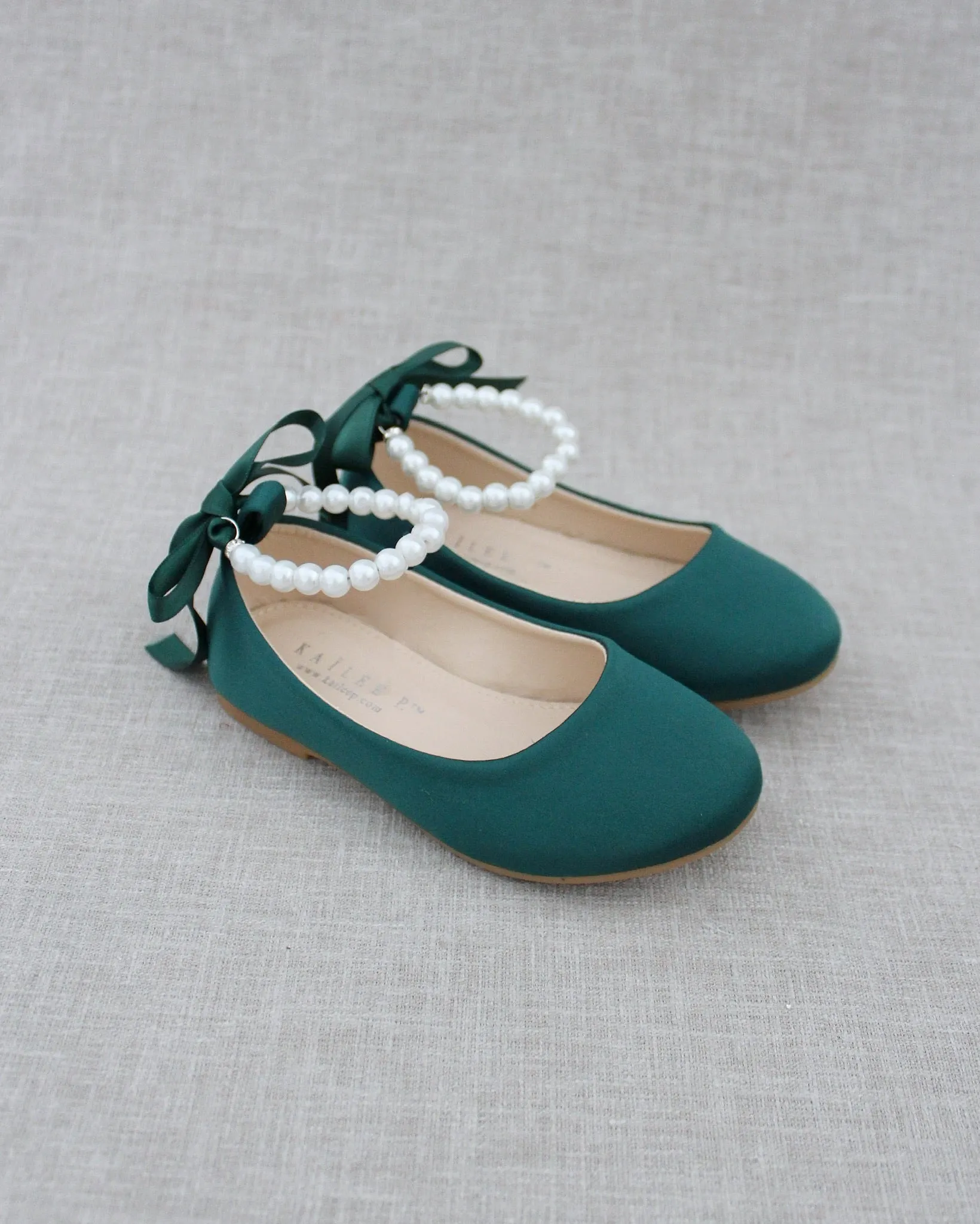 The result is: Satin Flats in Hunter Green with Pearl Ankle Straps