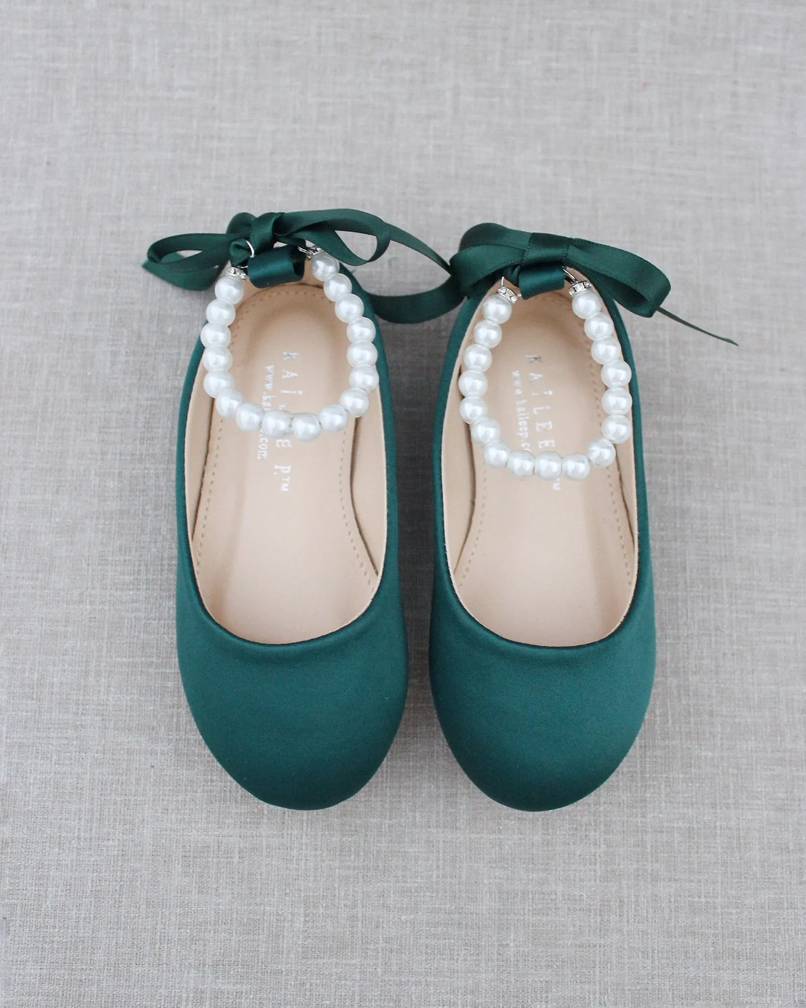 The result is: Satin Flats in Hunter Green with Pearl Ankle Straps