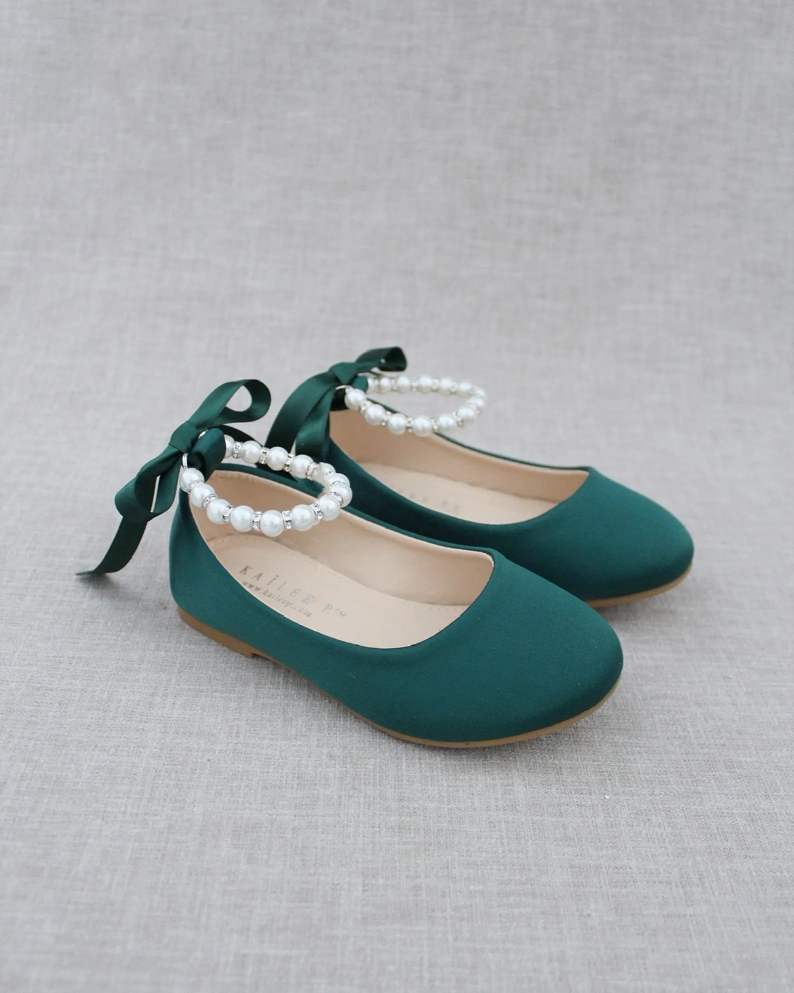 The result is: Satin Flats in Hunter Green with Pearl Ankle Straps