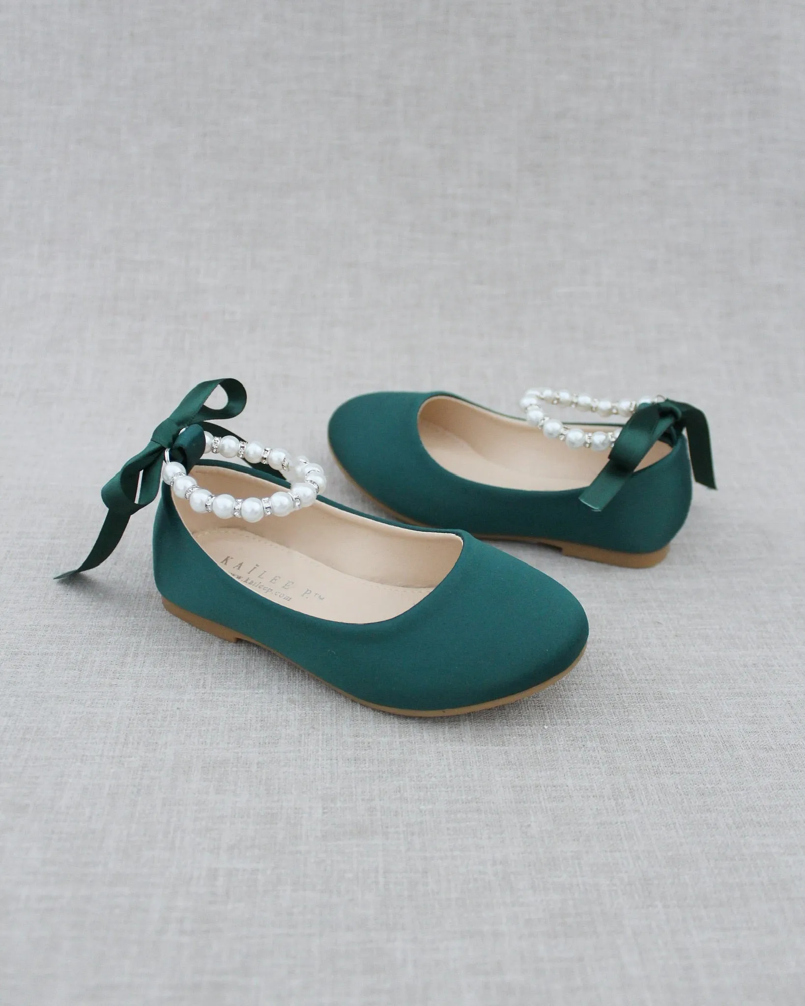 The result is: Satin Flats in Hunter Green with Pearl Ankle Straps